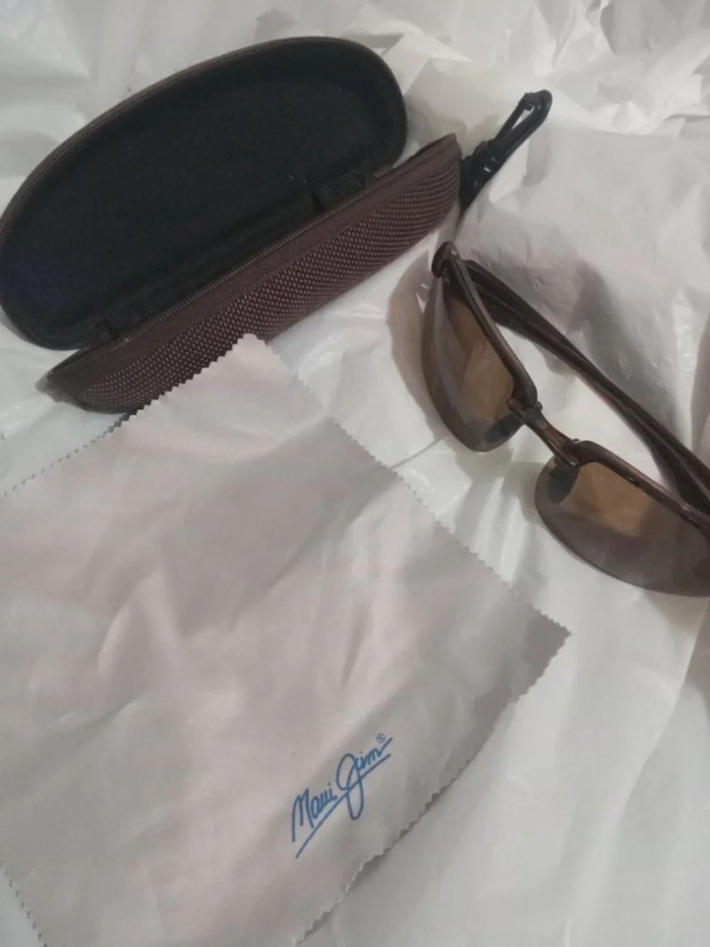 Maui Jim sunglasses and case